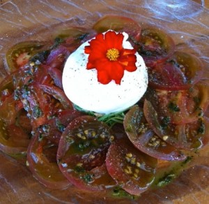 L’Écrin’s heirloom tomato salad includes a generous dollop of creamy burratina.